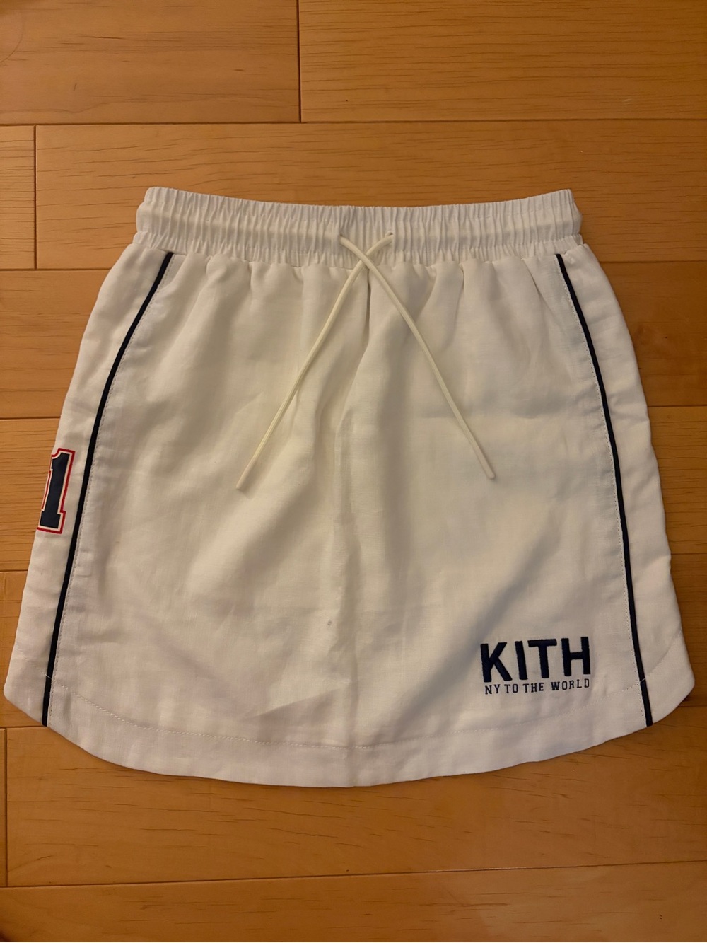 Kith White Girls' Skort with Navy Trim and Number Patch